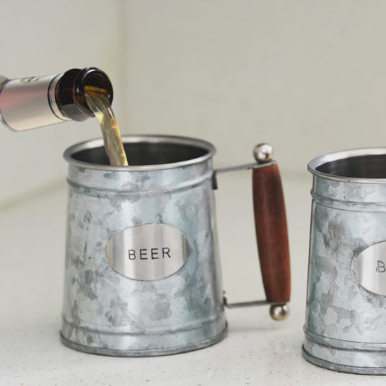 Handcrafted insulated stainless steel beer mug with wooden handle shown in a short product video | ALORAA